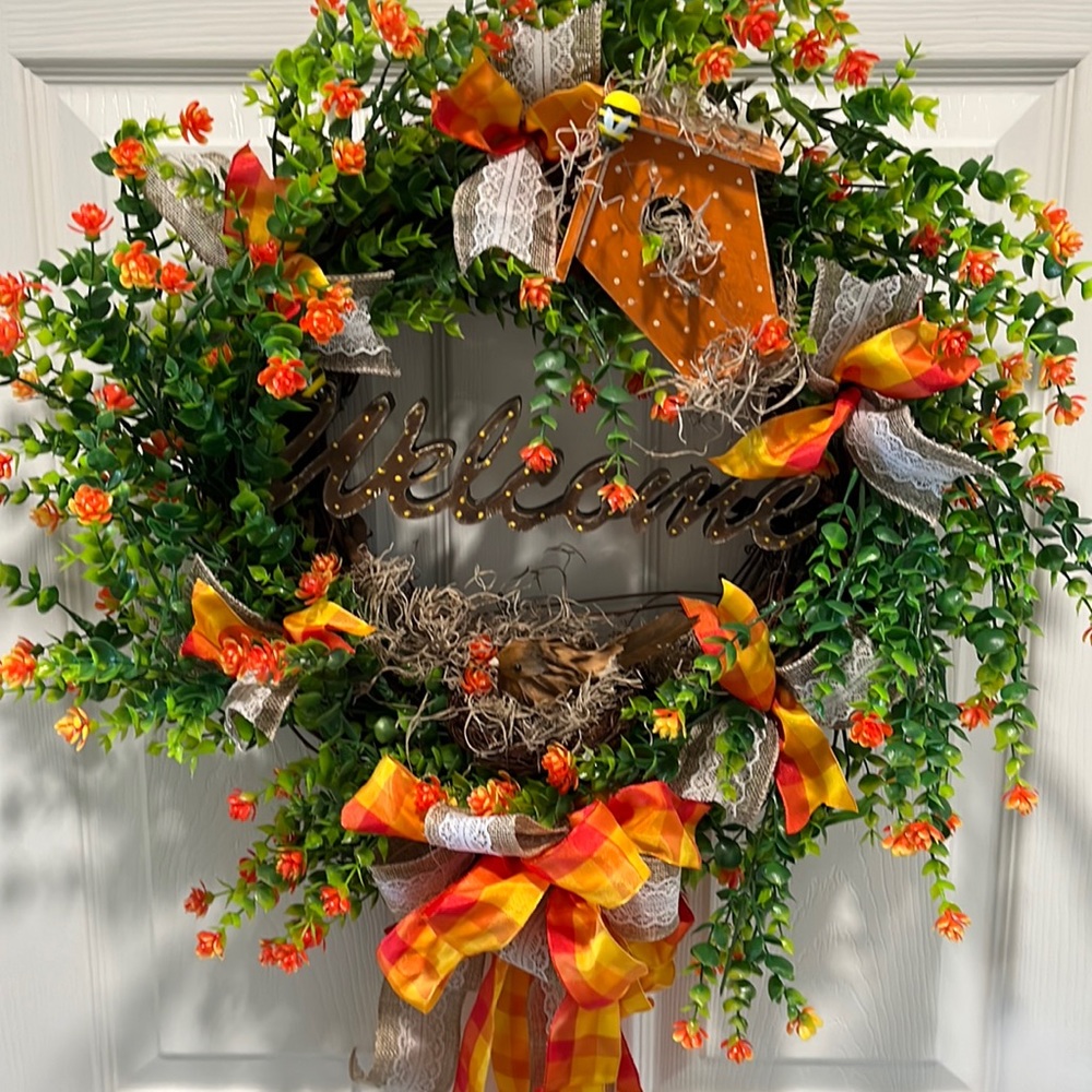 Floral bird and bee wreath